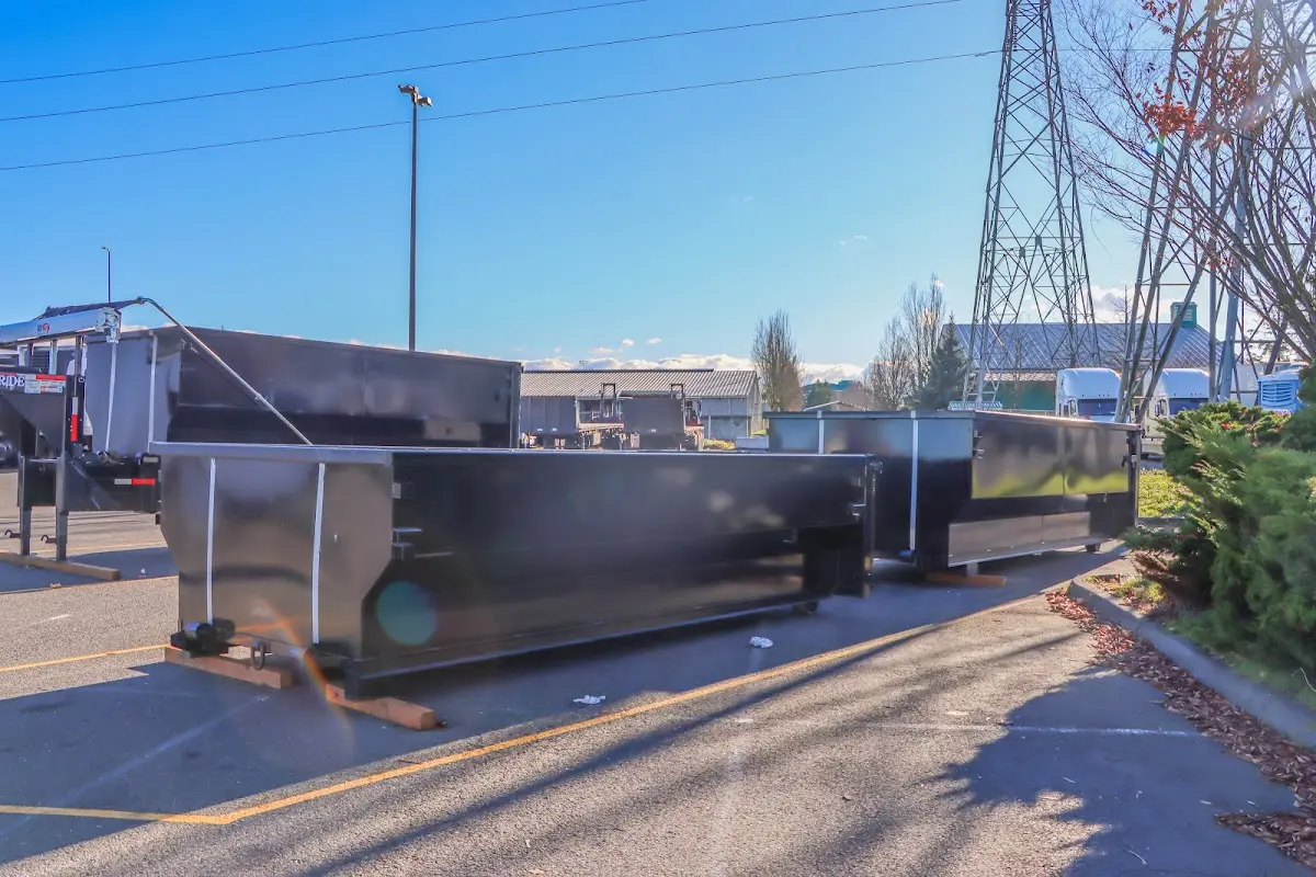 Roll-off dumpster ready for waste disposal at job site for Concrete Dumpster Rental in North Olmsted
